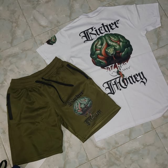 White Richer Than Money tee with a green serpent brain print, and olive shorts